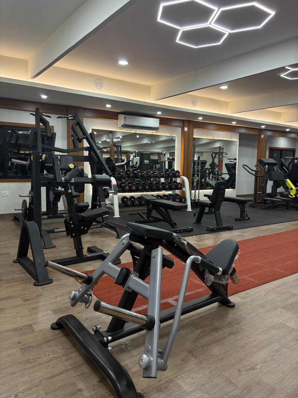 Inside Liger Fitness Vellimadukunnu - training area and premium equipment